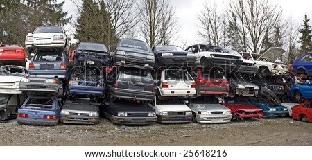 stock-photo-panorama-of-stacked-wrecks-on-car-cemetery-in-germany-25648216.jpg